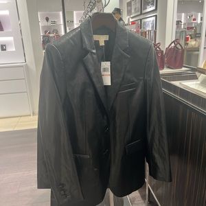 Leather jacket. New with tags. All sizes.